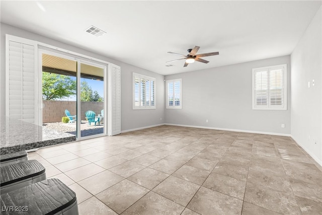 4519 Stardusk Falls Ave, North Las Vegas, NV 89084 - unfurnished room with ceiling fan, baseboards, and tile patterned floors