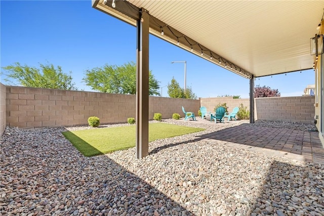 4519 Stardusk Falls Ave, North Las Vegas, NV 89084 - fenced backyard featuring a patio
