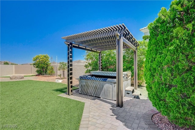 983 Cutter St, Henderson, NV 89011 - fenced backyard featuring a hot tub, a patio, and a pergola
