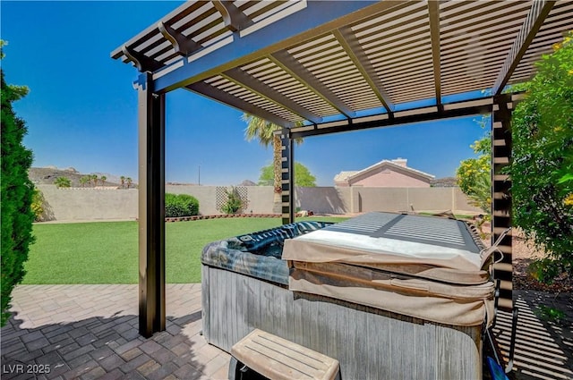 983 Cutter St, Henderson, NV 89011 - fenced backyard featuring a hot tub, a patio area, and a pergola