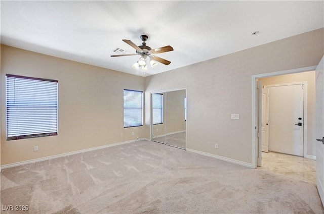 983 Cutter St, Henderson, NV 89011 - unfurnished bedroom with light carpet, ceiling fan, and a closet