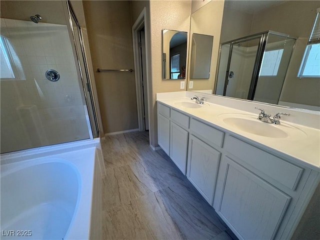 5861 Varese Dr, Las Vegas, NV 89141 - bathroom with a stall shower, double vanity, and a bath