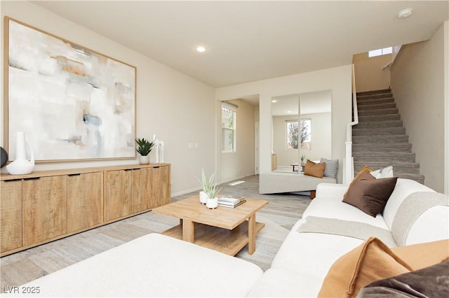 6730 Pivot Point St, Las Vegas, NV 89148 - living area featuring light wood-type flooring, stairway, and recessed lighting