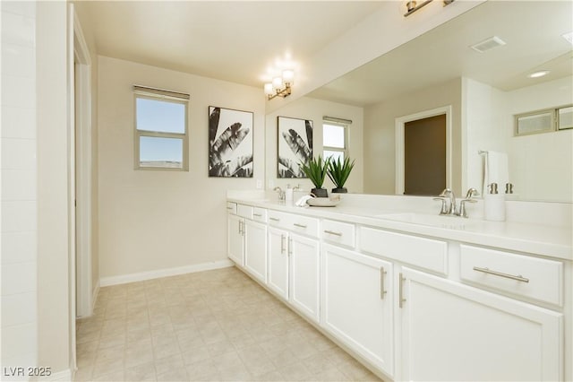 6730 Pivot Point St, Las Vegas, NV 89148 - full bath featuring double vanity and plenty of natural light