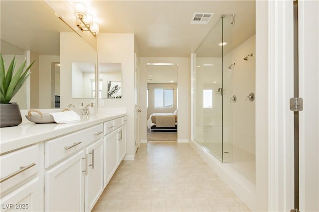 6730 Pivot Point St, Las Vegas, NV 89148 - full bathroom with vanity, connected bathroom, walk in shower, and tile patterned floors