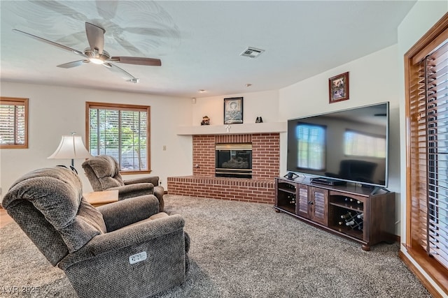 4075 E Oquendo Rd, Las Vegas, NV 89120 - carpeted living room with a fireplace and ceiling fan