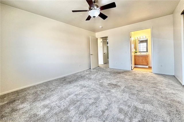 8410 Eldora Ave Unit 2046, Las Vegas, NV 89117 - unfurnished bedroom with light carpet, baseboards, ensuite bathroom, and a ceiling fan