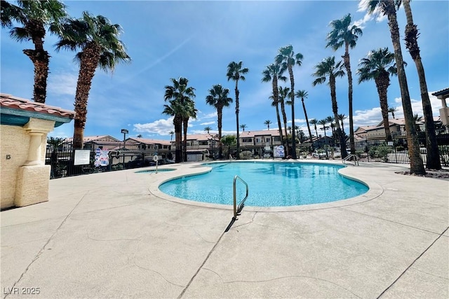 8410 Eldora Ave Unit 2046, Las Vegas, NV 89117 - community pool featuring a patio and a residential view