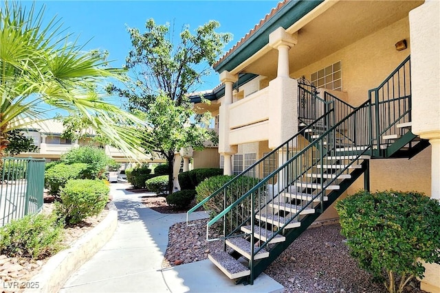 8410 Eldora Ave Unit 2046, Las Vegas, NV 89117 - doorway to property with a tiled roof and stucco siding