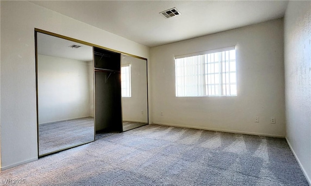 8410 Eldora Ave Unit 2046, Las Vegas, NV 89117 - unfurnished bedroom with carpet floors, a closet, and baseboards