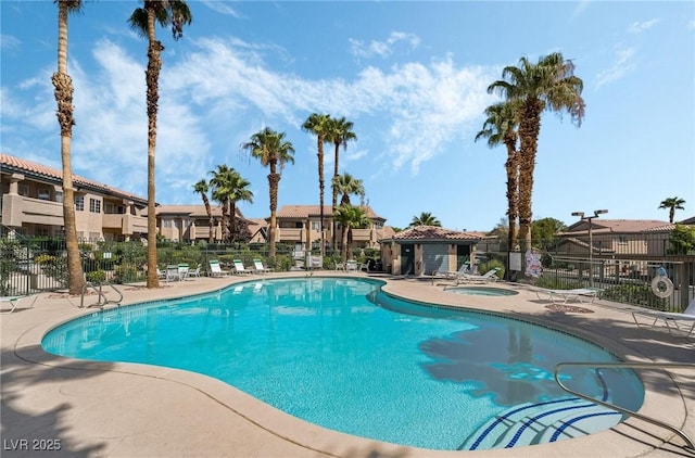 8410 Eldora Ave Unit 2046, Las Vegas, NV 89117 - community pool featuring a residential view, a community hot tub, and a patio