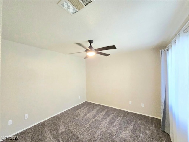2035 E Warm Springs Rd Unit 1017, Las Vegas, NV 89119 - empty room featuring dark colored carpet, a ceiling fan, and baseboards