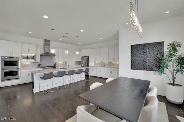 362 Port Reggio St, Las Vegas, NV 89138 - dining space with recessed lighting and dark wood-style flooring