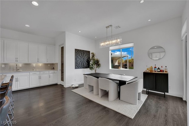362 Port Reggio St, Las Vegas, NV 89138 - dining room with dark wood-style floors, baseboards, recessed lighting, and a chandelier