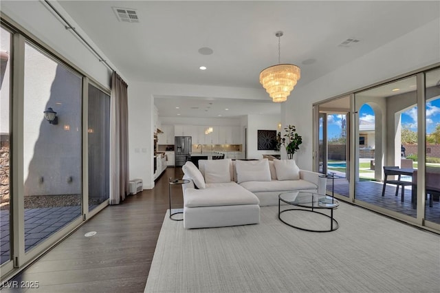 362 Port Reggio St, Las Vegas, NV 89138 - living room with dark wood finished floors, a chandelier, and recessed lighting