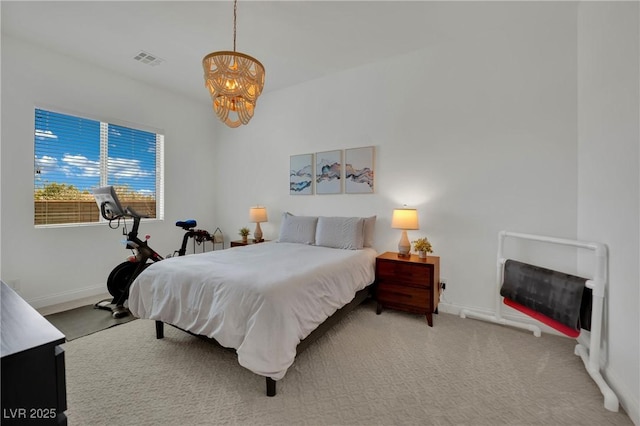 362 Port Reggio St, Las Vegas, NV 89138 - carpeted bedroom with a chandelier and baseboards