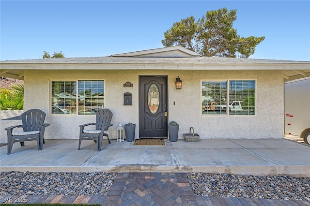 615 D Ave, Boulder City, NV 89005 - property entrance with stucco siding and a patio