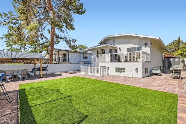 615 D Ave, Boulder City, NV 89005 - back of house with a patio, stucco siding, and a gazebo