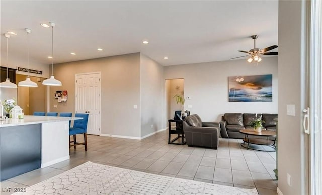 10262 Havasu Falls St, Las Vegas, NV 89141 - living area with light tile patterned flooring, ceiling fan, recessed lighting, and baseboards