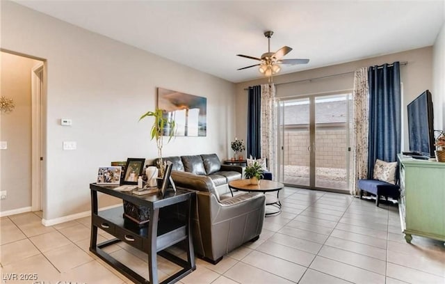 10262 Havasu Falls St, Las Vegas, NV 89141 - living room with light tile patterned flooring, a ceiling fan, and baseboards