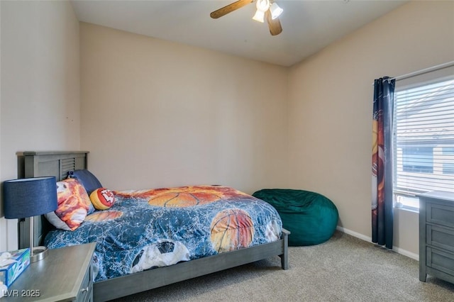 2090 Eaglepath Cir, Henderson, NV 89074 - bedroom featuring multiple windows, light carpet, baseboards, and a ceiling fan