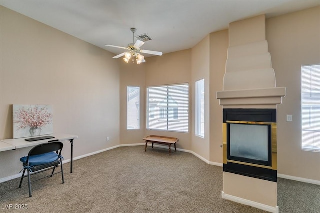 2090 Eaglepath Cir, Henderson, NV 89074 - office area with carpet, healthy amount of natural light, a large fireplace, and ceiling fan