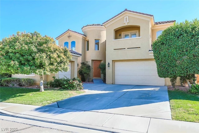 5043 Gable Crest Ct, Las Vegas, NV 89141 - mediterranean / spanish home featuring driveway, stucco siding, a tiled roof, and a garage