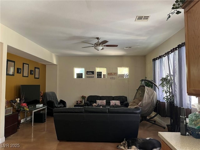 5043 Gable Crest Ct, Las Vegas, NV 89141 - living room featuring plenty of natural light and a ceiling fan