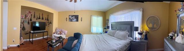 5043 Gable Crest Ct, Las Vegas, NV 89141 - bedroom featuring wood finished floors, vaulted ceiling, and arched walkways