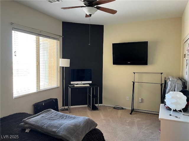 5043 Gable Crest Ct, Las Vegas, NV 89141 - carpeted bedroom with multiple windows and ceiling fan