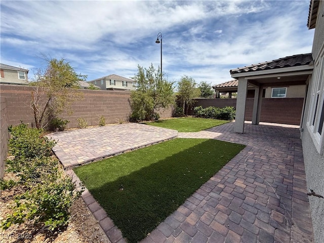 2620 Tolmezzo St, Henderson, NV 89044 - view of yard featuring a patio area