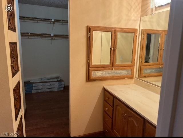 3930 University Center Dr Unit 612, Las Vegas, NV 89119 - bathroom featuring vanity and wood finished floors