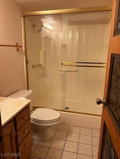 3930 University Center Dr Unit 612, Las Vegas, NV 89119 - full bath featuring an enclosed shower, vanity, toilet, and tile patterned floors