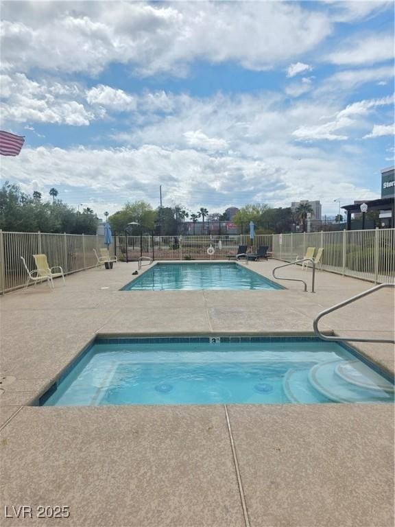 3930 University Center Dr Unit 612, Las Vegas, NV 89119 - community pool featuring a patio