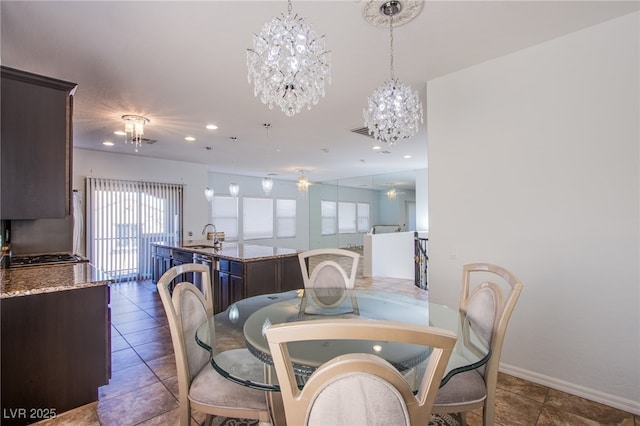 1794 Morro Vista Dr, Las Vegas, NV 89135 - dining space featuring a chandelier, tile patterned floors, recessed lighting, and baseboards