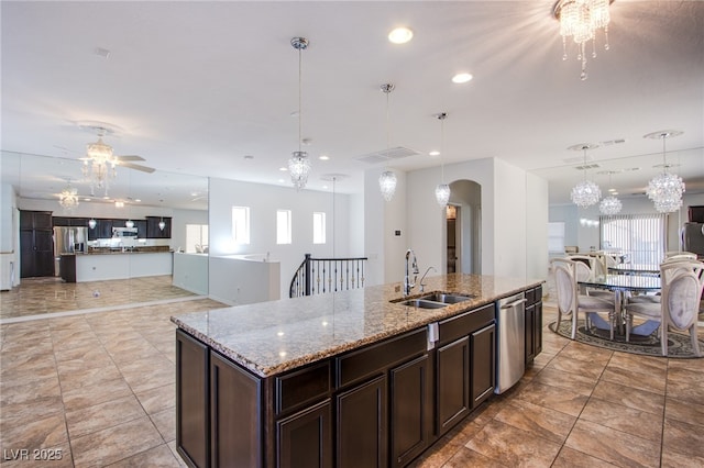 1794 Morro Vista Dr, Las Vegas, NV 89135 - kitchen featuring a sink, appliances with stainless steel finishes, open floor plan, plenty of natural light, and recessed lighting