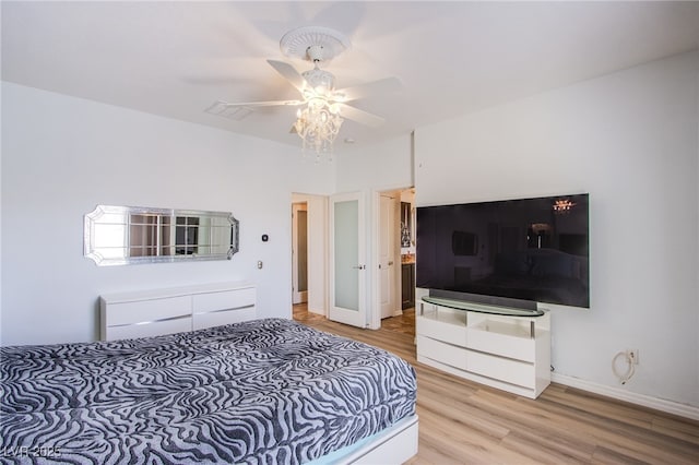 1794 Morro Vista Dr, Las Vegas, NV 89135 - bedroom with light wood-style floors, baseboards, and ceiling fan