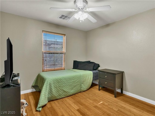 8754 Brindisi Park Ave, Las Vegas, NV 89148 - bedroom with baseboards, light wood-style floors, and ceiling fan