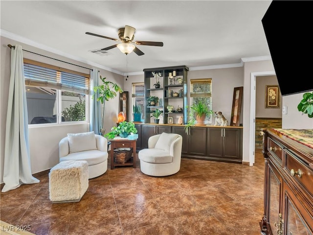8754 Brindisi Park Ave, Las Vegas, NV 89148 - living area with crown molding and a ceiling fan