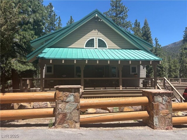 4178 Matterhorn Way, Las Vegas, NV 89124 - view of front facade with a porch, metal roof, and a standing seam roof