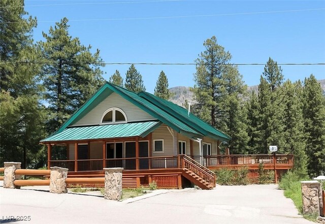 4178 Matterhorn Way, Las Vegas, NV 89124 - view of front of house with metal roof and a porch