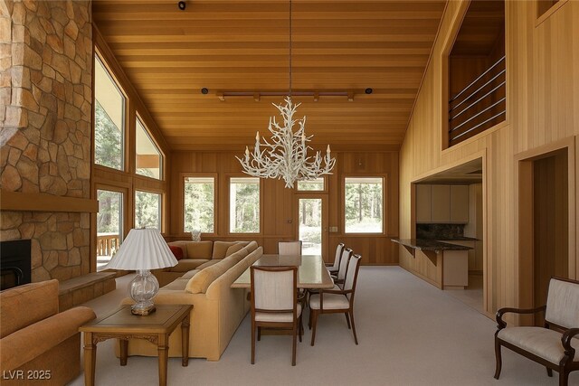 4178 Matterhorn Way, Las Vegas, NV 89124 - living room with a chandelier, wooden ceiling, healthy amount of natural light, high vaulted ceiling, and a fireplace