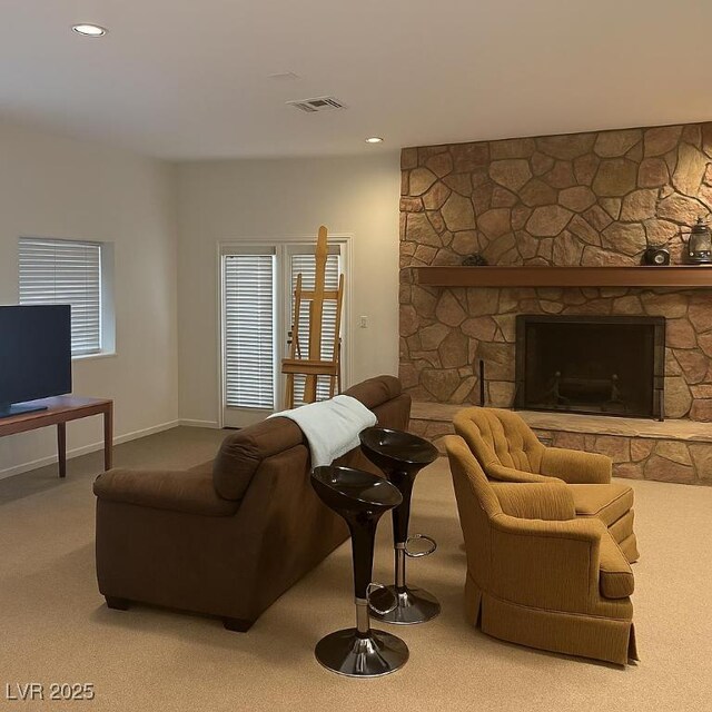 4178 Matterhorn Way, Las Vegas, NV 89124 - living room featuring carpet, a stone fireplace, recessed lighting, and baseboards