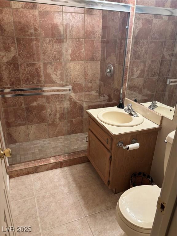 4178 Matterhorn Way, Las Vegas, NV 89124 - bathroom featuring vanity, a shower stall, and toilet