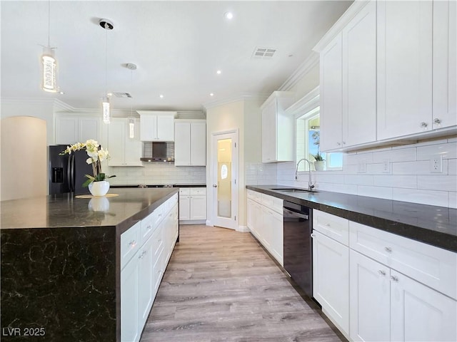 5500 Santovito St, Pahrump, NV 89061 - kitchen featuring a sink, dishwashing machine, crown molding, black fridge, and backsplash