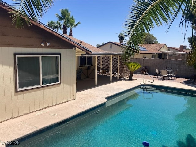 5821 Santa Catalina Ave, Las Vegas, NV 89108 - view of swimming pool featuring a patio area