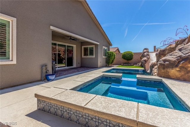 8 Via Tiberina, Las Vegas, NV 89011 - view of swimming pool featuring an in-ground hot tub, a patio area, a ceiling fan, and a fenced backyard