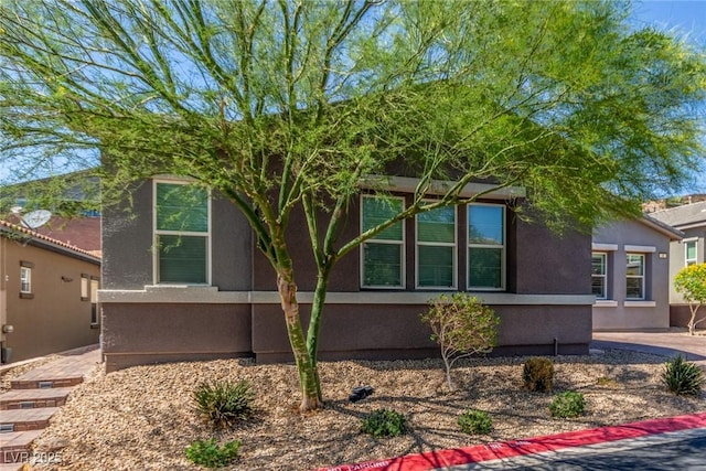 8 Via Tiberina, Las Vegas, NV 89011 - view of side of home featuring stucco siding