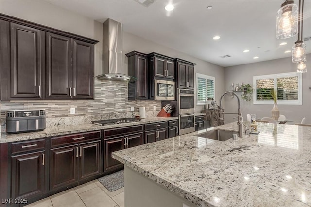 8 Via Tiberina, Las Vegas, NV 89011 - kitchen featuring a sink, wall chimney range hood, stainless steel appliances, decorative backsplash, and recessed lighting
