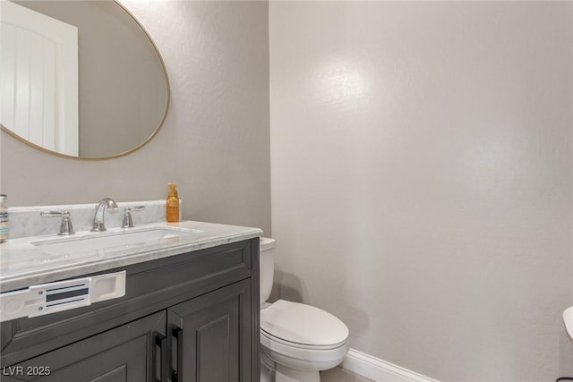 8 Via Tiberina, Las Vegas, NV 89011 - half bathroom with toilet, vanity, and baseboards
